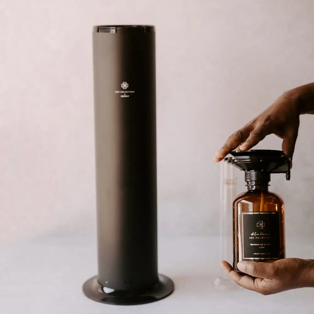 Roma Magnifiscent electric diffuser unit for large space scenting with a dark cylindrical design